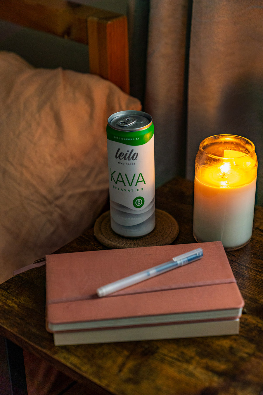Woman unwinding at home in the evening with a Leilo kava drink