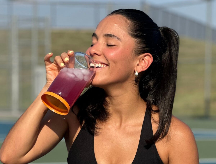 Friends laughing together with Leilo kava drinks